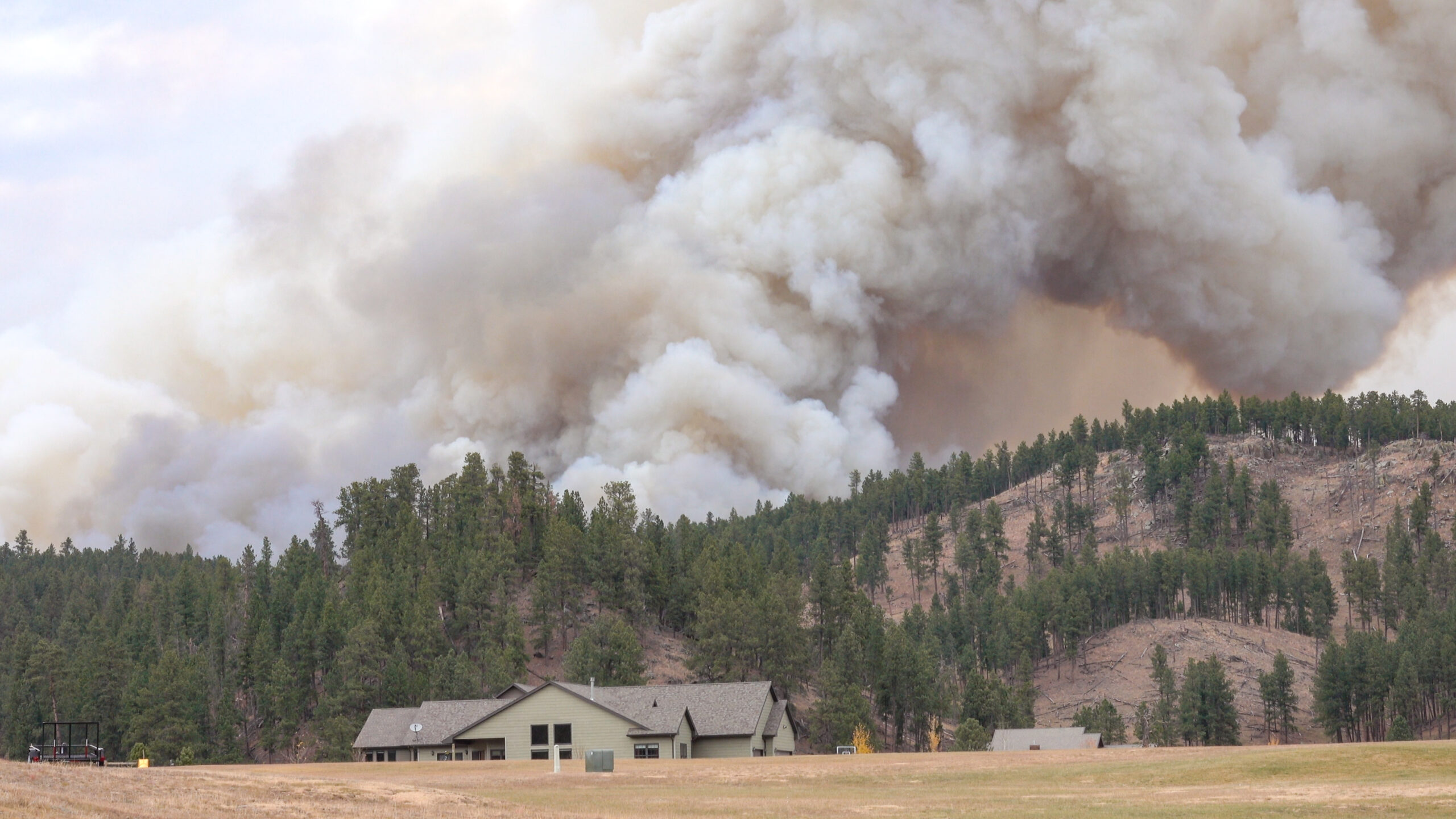 Wildfire smoke near a home